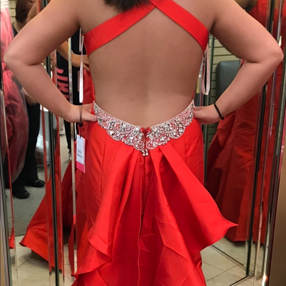 One beautiful red prom dress with sliver sequins and stones only worn one time